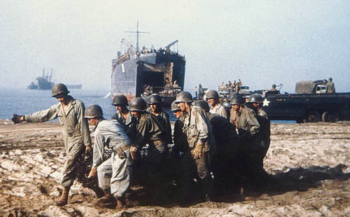 U.S. troops and equipment land at Salerno, Italy in September 1943